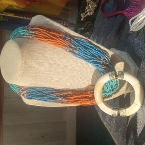 Antique White Jade  bracelet & a 30 strand,  blue, coral and turquoise necklace